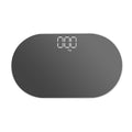 Black digital scale with a digital display on a white background