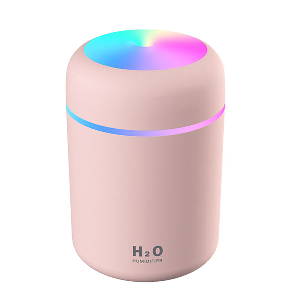 Pink humidifier with colorful LED light on a white background