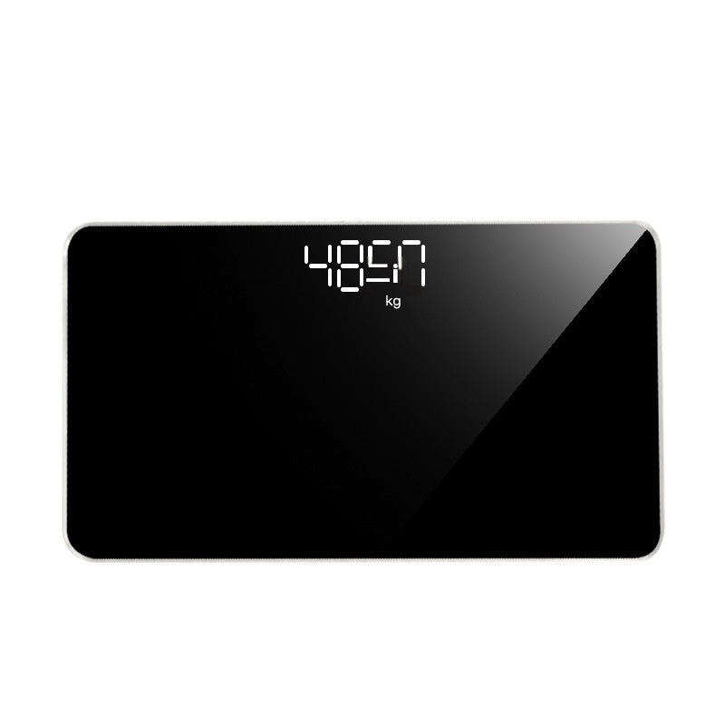 Black digital bathroom scale on a white background